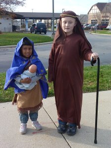 Our Little Holy Family at the Christmas Parade- © SalveMaterDei.com, 2011.